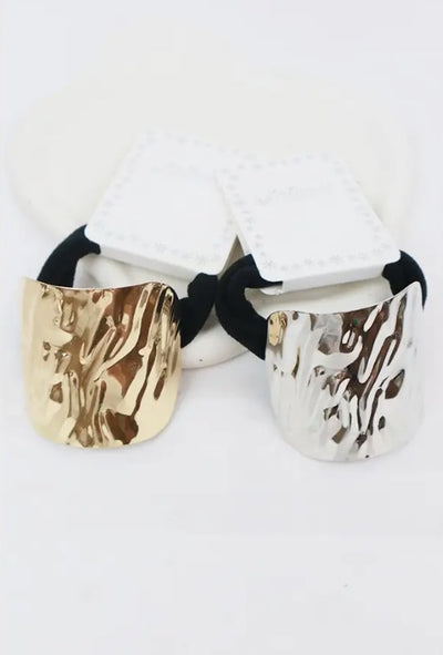 Metal pony tail cuff